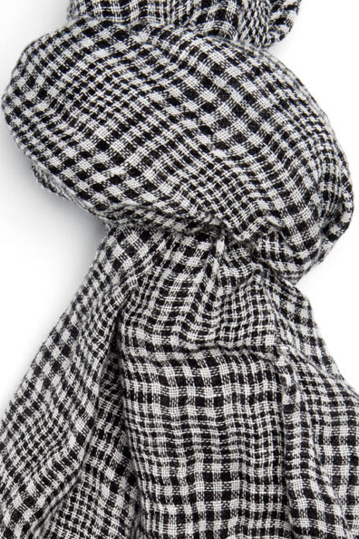 Leinenschal, schwarz-weiß kariert, mit Fransen.