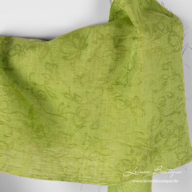 Hellgrüner Jacquard-Leinen mit eingewebten Blumen