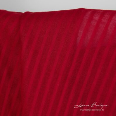 Roter Leinenstoff mit offen und dicht gewebten Streifen