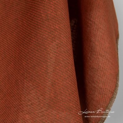 Leinenstoff mit diagonalen orange und braunen Streifen