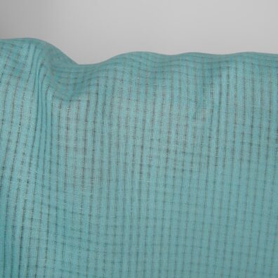 Leinenstoff türkis mit durchsichtigen Karos ist zum Nähen von Kleidung und Heimtextilien geeignet